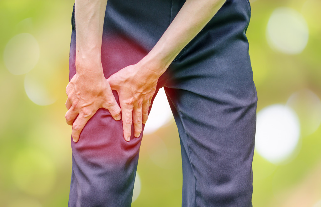 adult man with knee pain