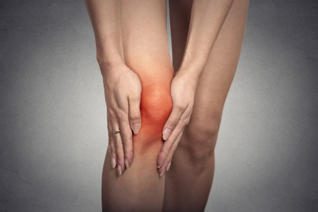 closeup of knee and joint pain female